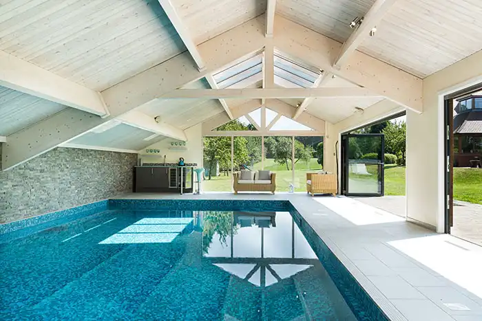 inside view of a barn style indoor pool 