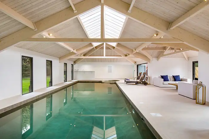 Pool heating heat pump indoor view of a heated pool