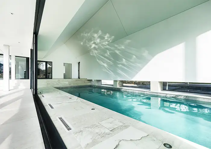 Energy Efficient Indoor Pool Design a narrow long indoor pool