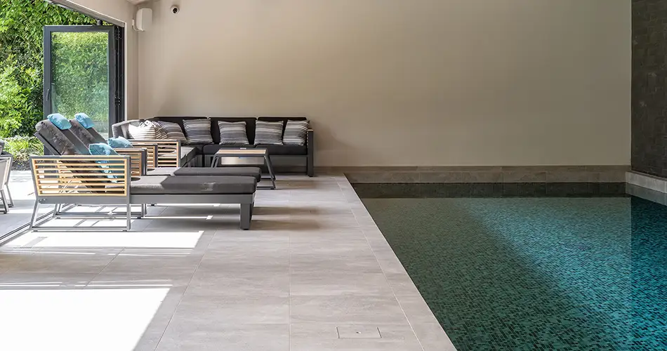 Indoor Pool with Seating Area