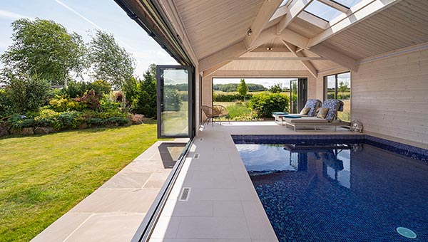 pool house with bifold door opened